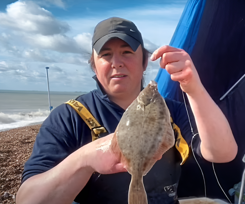 Becky Lee Birtwhistle Hodges holding a fish