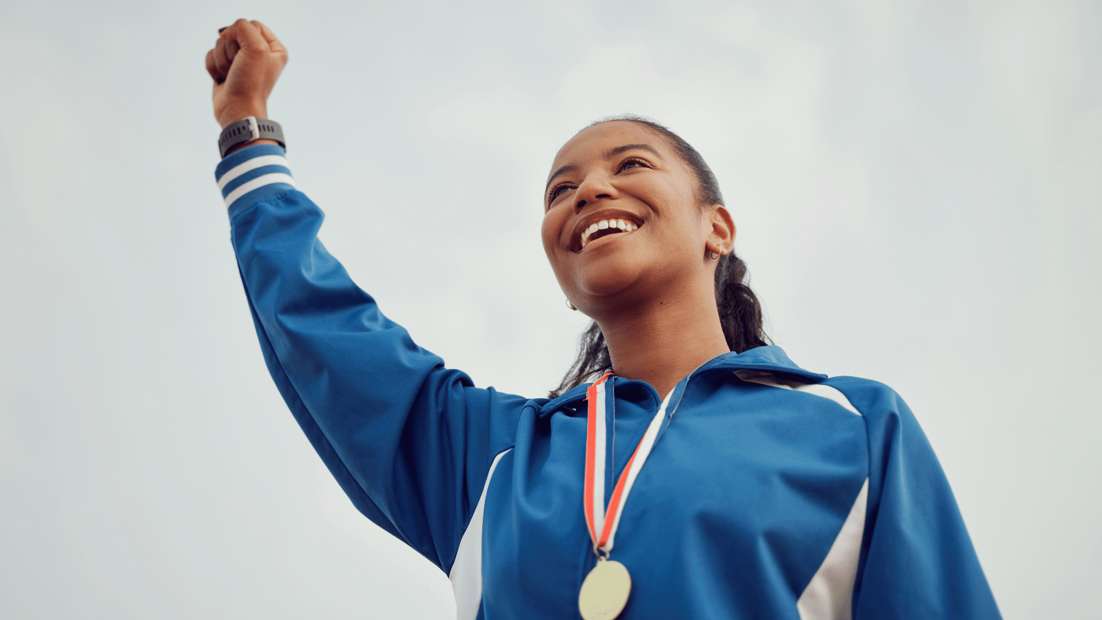 Sportswoman wearing a medal