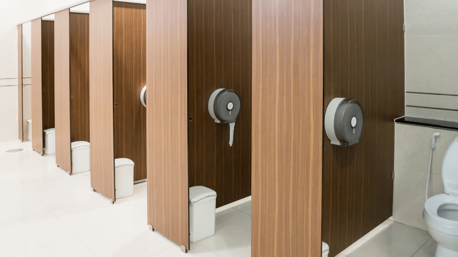 A row of toilet cubicles